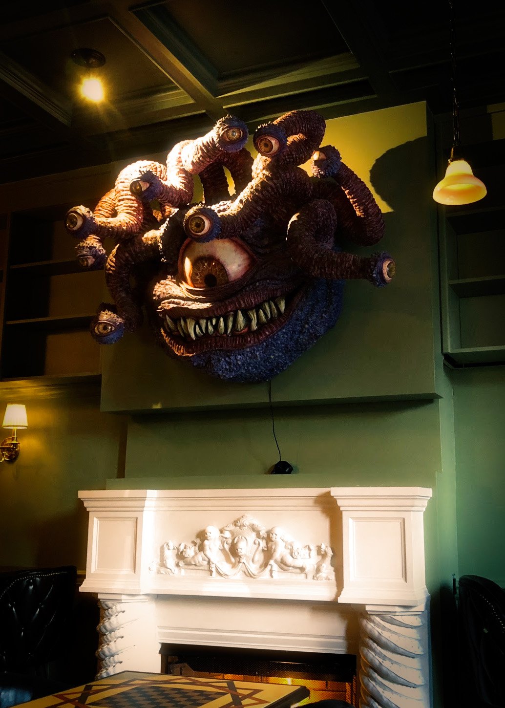 The Beholder of the Victorian Hunting Lodge — eyestalks, mounted on the wall